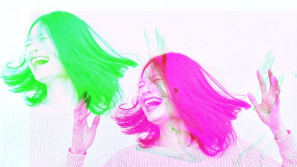 Image of woman with pink and green effect applied