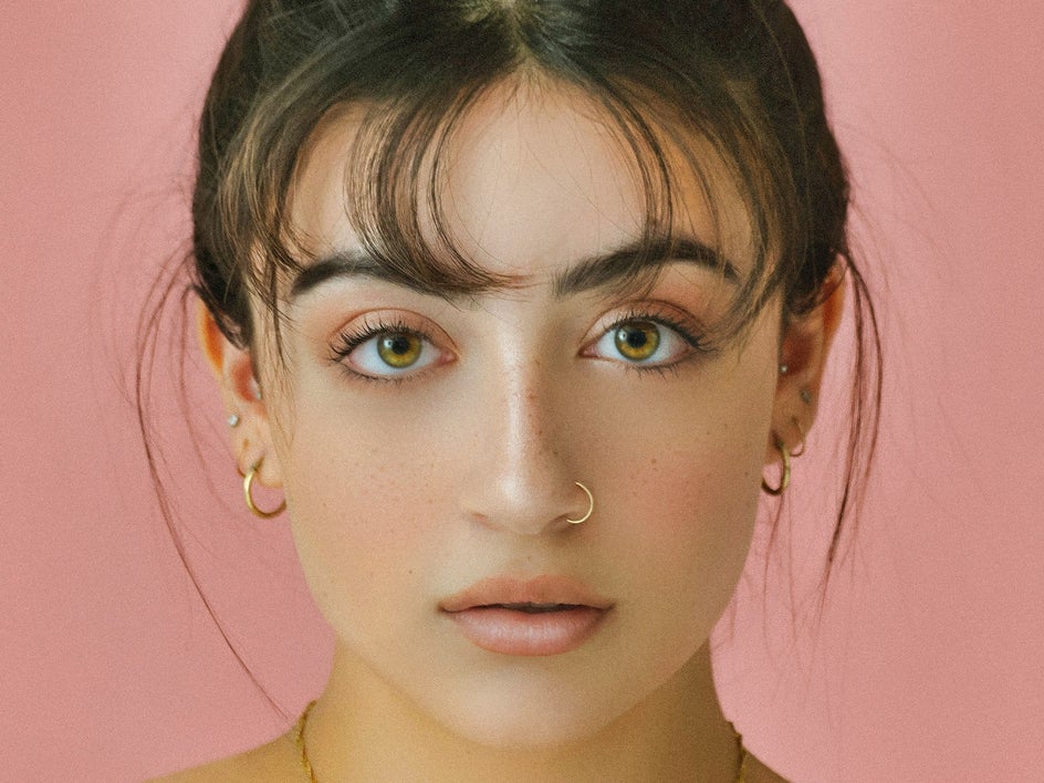 female portrait pink background