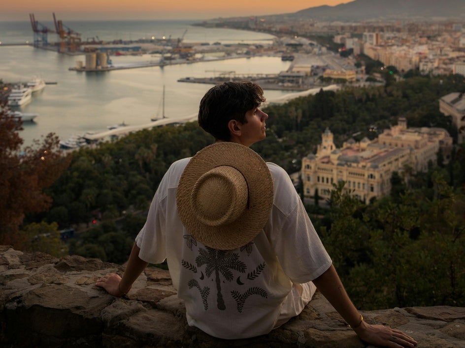 before: photo of person looking over coastal scenery