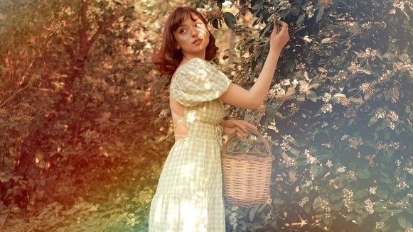 light leaks effect in darkroom befunky featured image of woman from tutorial in vintage setting