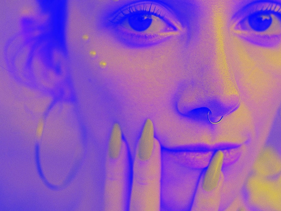 after: same portrait with negative effect applied to create an inverted, purple effect